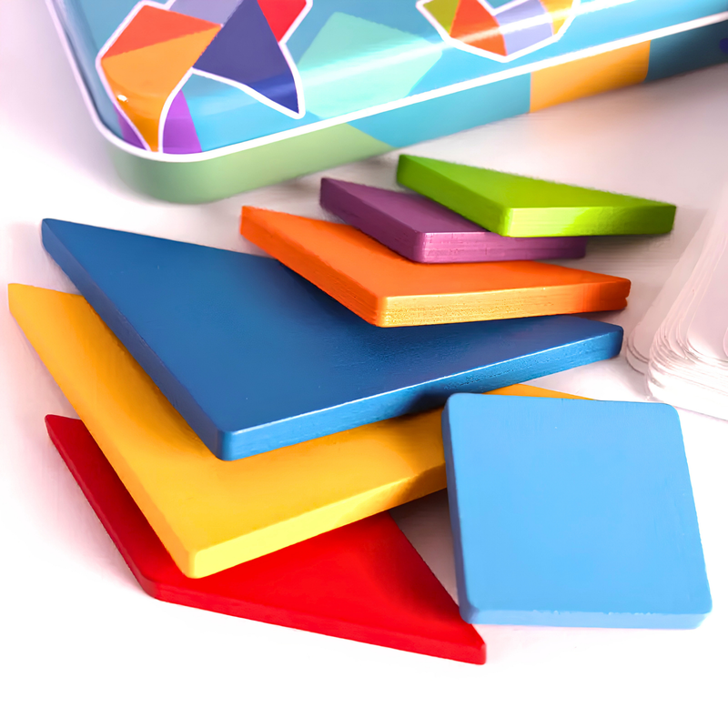 Colourful tangram puzzle pieces arranged next to a tin on a white background